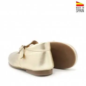 mercedita nina dorada piel