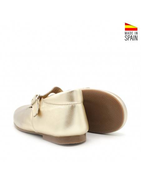 mercedita nina dorada piel