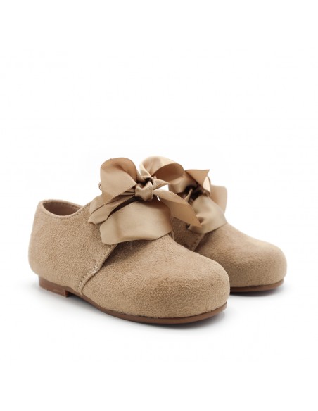 zapatos vrestir para niño