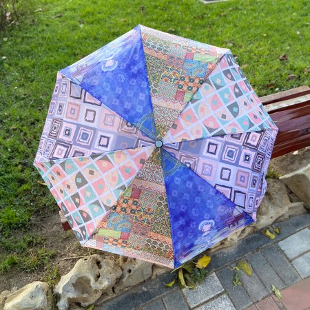 Paraguas plegable morado