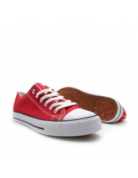 Detalle puntera de goma zapatilla lona roja