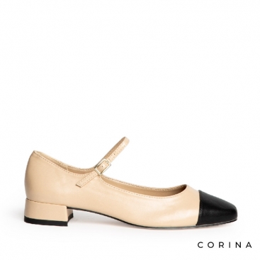 zapato beige con punta negra​