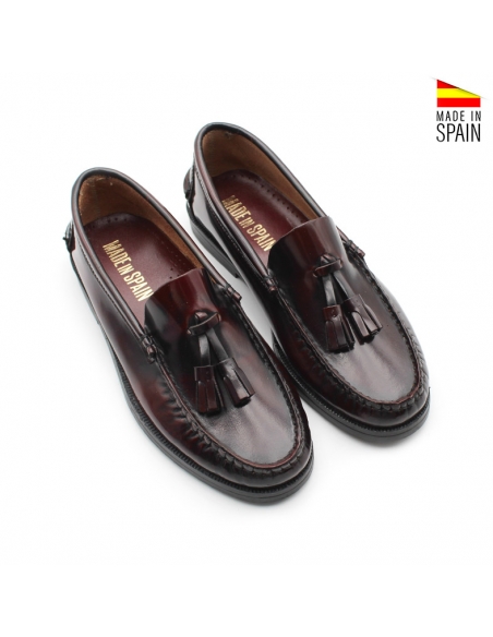 zapatos castellanos niño burdeos vista superior en piel con borlas