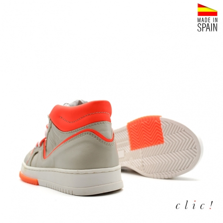 Botín deportivo fluor