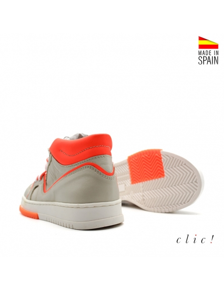 Botín deportivo fluor