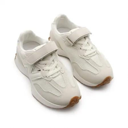 zapatillas de deporte blancas niña​