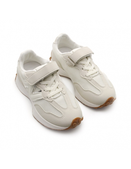 zapatillas de deporte blancas niña​