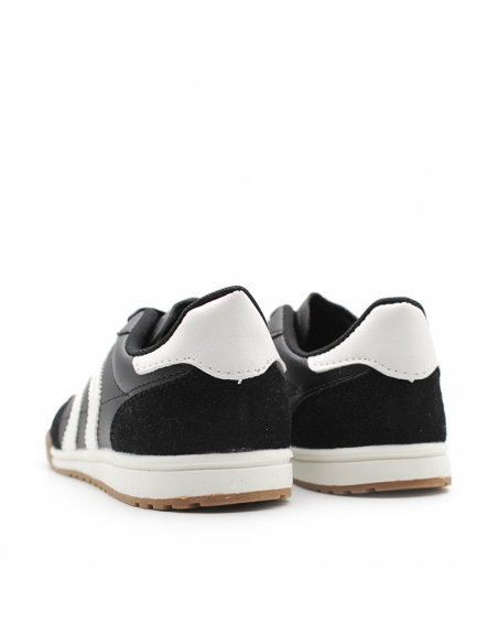 zapatillas deportivas negras niño​