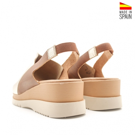 Cuñas doradas de mujer