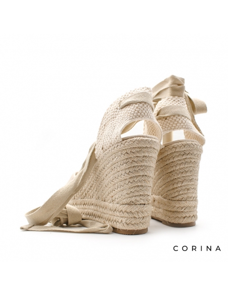 alpargatas cuña alta beige​