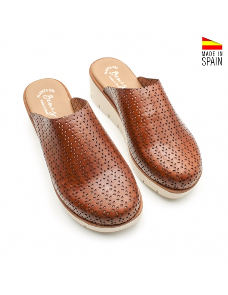 zuecos de piel