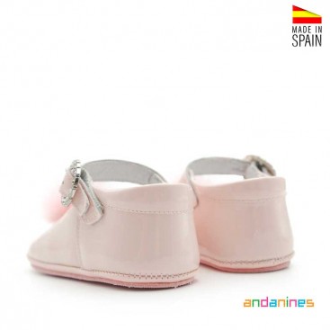 Calzado rosa con pompón bebé