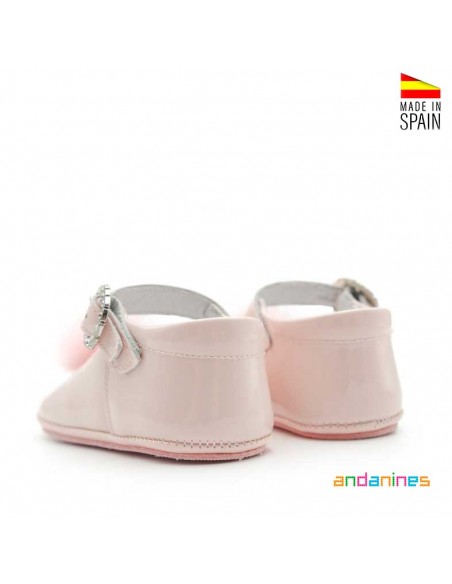 Calzado rosa con pompón bebé