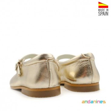 Zapatos dorados niña