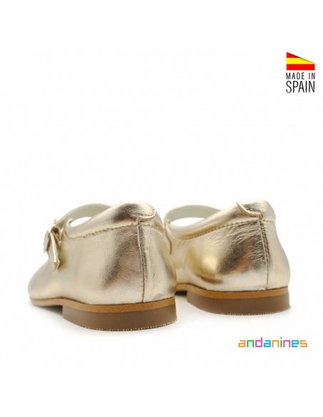 Zapatos dorados niña