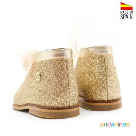 Sandalia dorada bebé