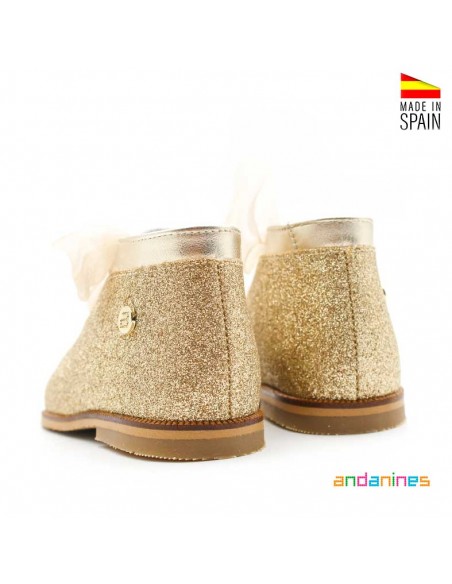 Sandalia dorada bebé