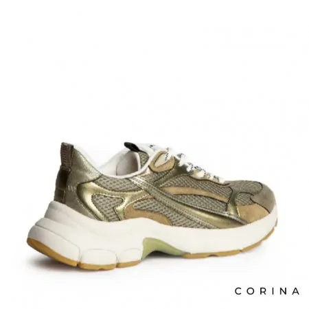 Sneakers doradas modernas mujer