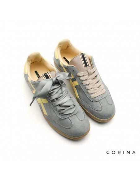 zapatillas celestes mujer​