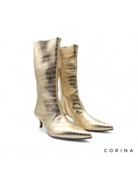 botas doradas mujer​