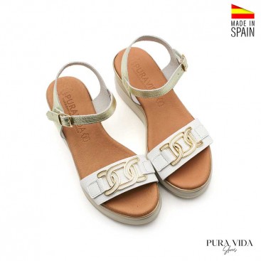 sandalias elegantes blancas cuna