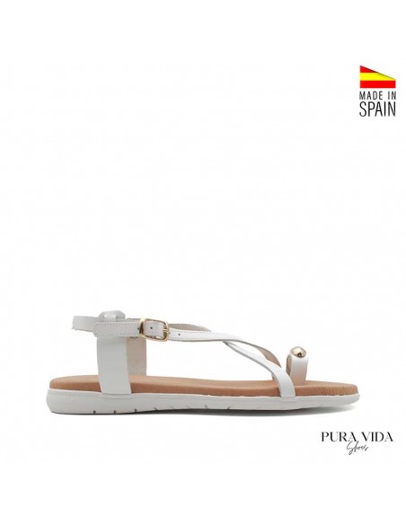 Sandalia plana blanca elegante con diseño minimal y confort diario Pura Vida Shoes