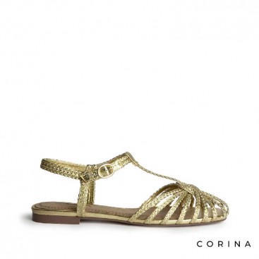 cangrejera dorada mujer trenzada Corina