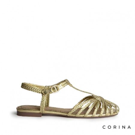 cangrejera dorada mujer trenzada Corina