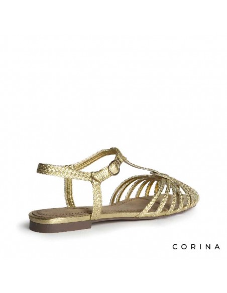 sandalia dorada trenzada mujer vista lateral
