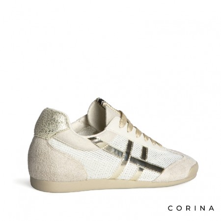 Zapatilla dorada mujer perfil bajo