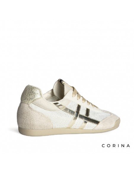 Zapatilla dorada mujer perfil bajo