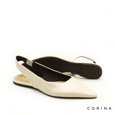 Zapato plano beige estilo minimal con punta afilada