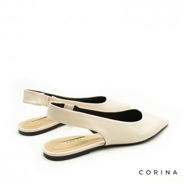 Salón plano beige destalonado elegante mujer