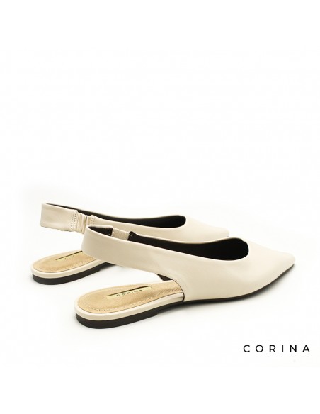 Salón plano beige destalonado elegante mujer