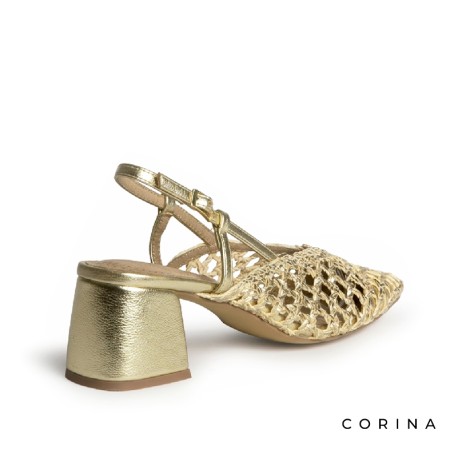 Zapato elegante dorado verano