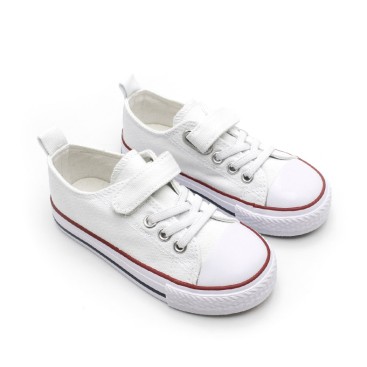 zapatillas blancas niño con puntera de goma