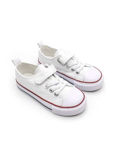 zapatillas blancas niño con puntera de goma