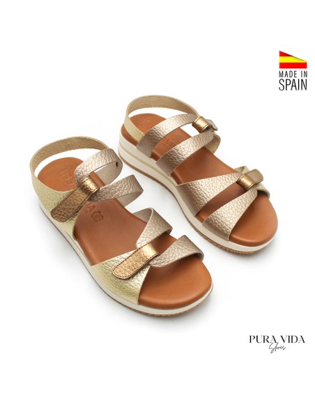 sandalia piel dorada con cuña baja mujer