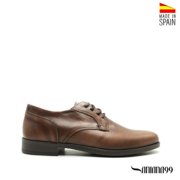 zapatos marrones hombre traje piel