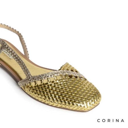 zapato dorado mujer plano con diseño trenzado verano