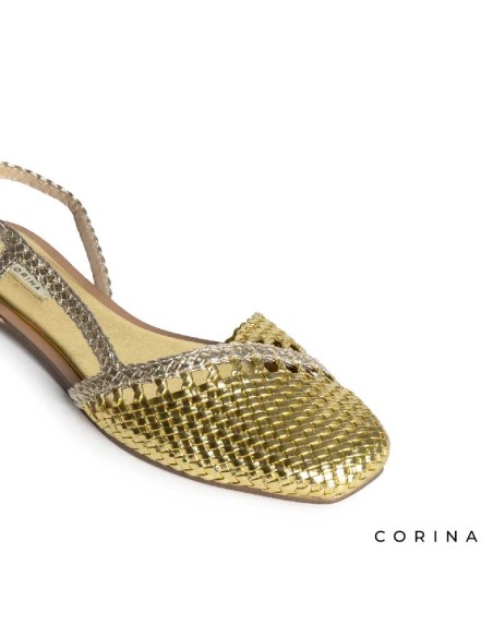 zapato dorado mujer plano con diseño trenzado verano