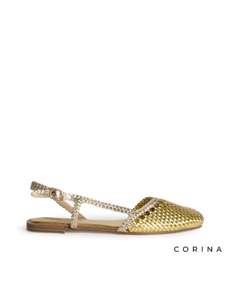 zapato plano dorado mujer trenzado con hebilla lateral