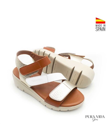 sandalias cuña mujer piel blanco dorado cuero vista inclinada
