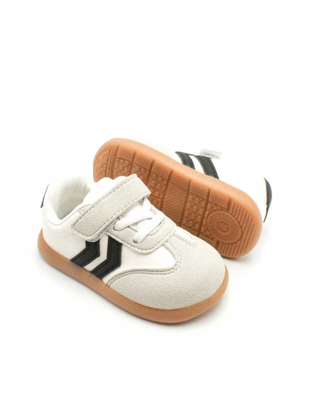 bambas de bebe​ blancas con rayas negras