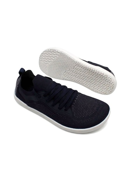Zapatillas barefoot azul marino con suela blanca flexible vista inferior
