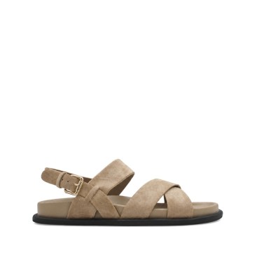 Sandalia tiras beige hombre con hebilla ajustable.