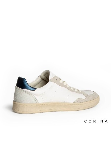 Zapatilla urbana mujer Corina blanca con perforado lateral