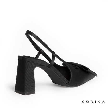 Zapato elegante negro de mujer con tira trasera elástica