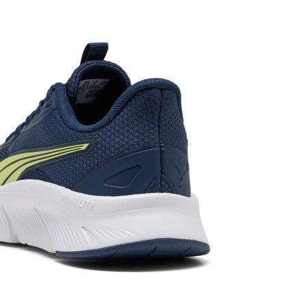 Talón de zapatillas Puma FlexFocus Lite Modern azul marino con detalle lima