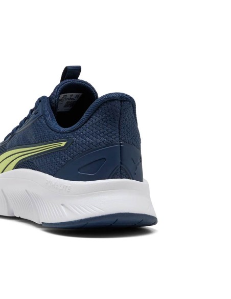 Talón de zapatillas Puma FlexFocus Lite Modern azul marino con detalle lima